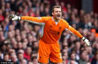 1412024580031_wps_51_Goalkeeper_Simon_Mignolet.jpg