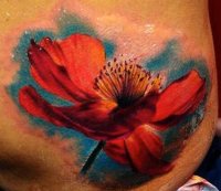 realistic-flower-tattoo-on-hip.jpg