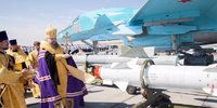 photo-an-orthodox-bishop-blesses-russian-missiles-for-airstrikes-in-syria.jpg