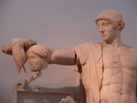 1200px-Zeus'_temple_in_Olimpia,_frontone_west,_Apollo.jpg