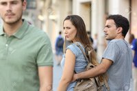 88396775-disloyal-woman-looking-another-man-and-her-angry-boyfriend-looking-at-her-on-the-street.jpg