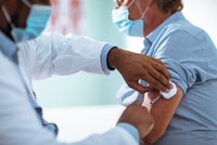 man-getting-vaccin-istock.jpg