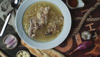 top-view-bone-broth-soup-khash-served-with-garlic-vinegar-750x430.jpg