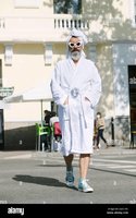 man-in-bathrobe-crossing-the-street-2G05TR5.jpg