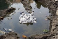 brooklyn-street-art-isaac-cordal-Another_concrete_island_Brussels_04-11-web.jpg