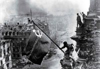 Raising+a+Flag+over+the+Reichstag+Yevgeny+Khaldei+1945.png