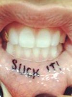 07-280612-kesha-reveals-new-tattoo-lgn.jpg