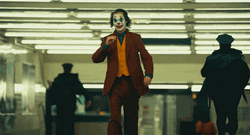 joker-walking-with-cigarette-d8xhlwj3orxlc4lg.gif
