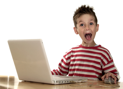 happy-kid-at-computer.jpeg