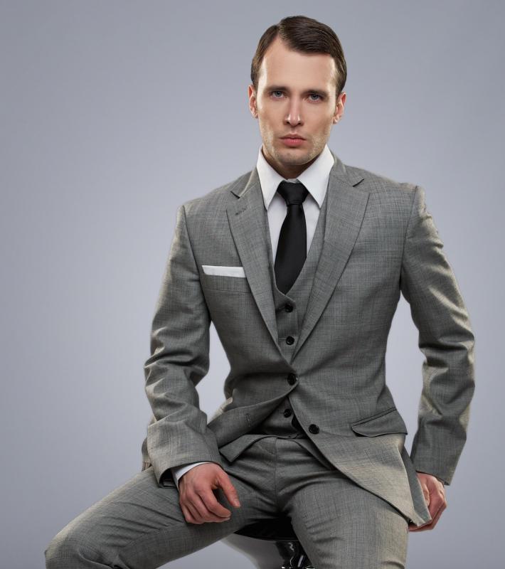 man-wearing-a-suit-tie-and-a-vest.jpg