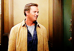 Chandler-Laughing-to-Himself.gif