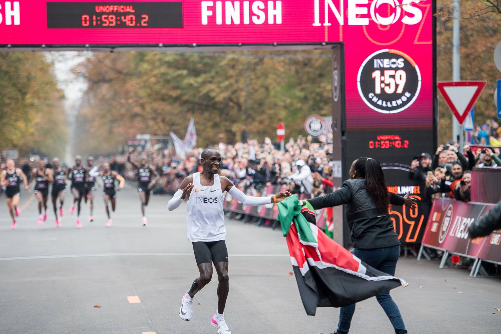 eliud-kipchoge-crossing-line-michael-gruber-1676x1118.jpg